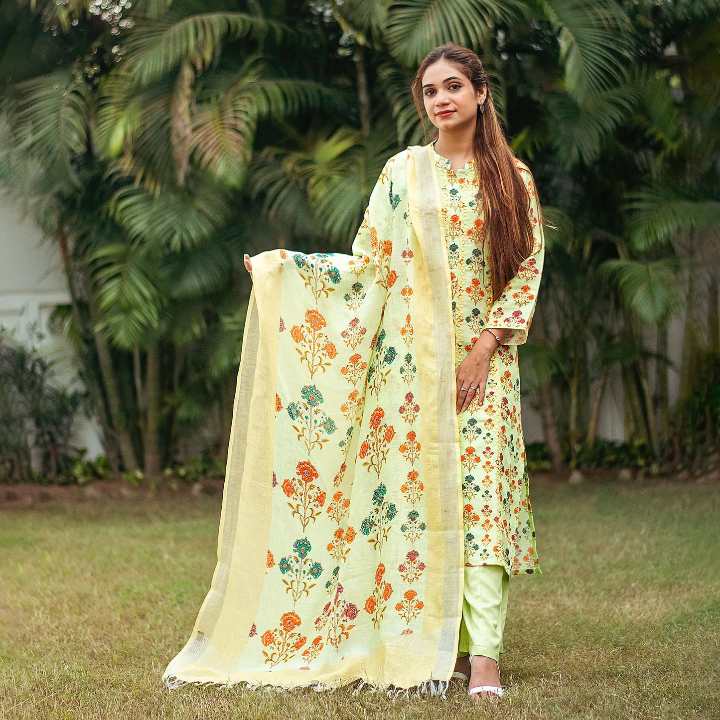 Tea green printed linen kalidar kurta with applique work, green linen dupatta and green palazzo