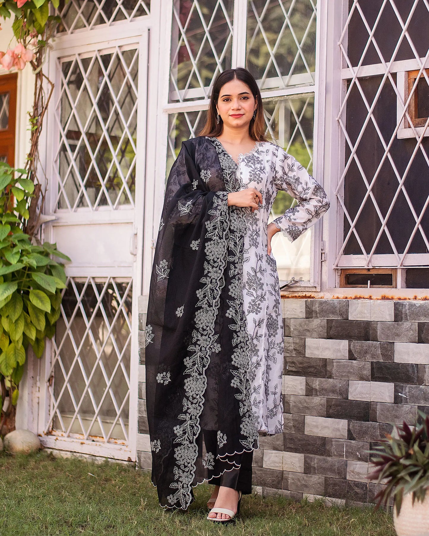 Embroidered white supernet kurta & black supernet dupatta with black trousers