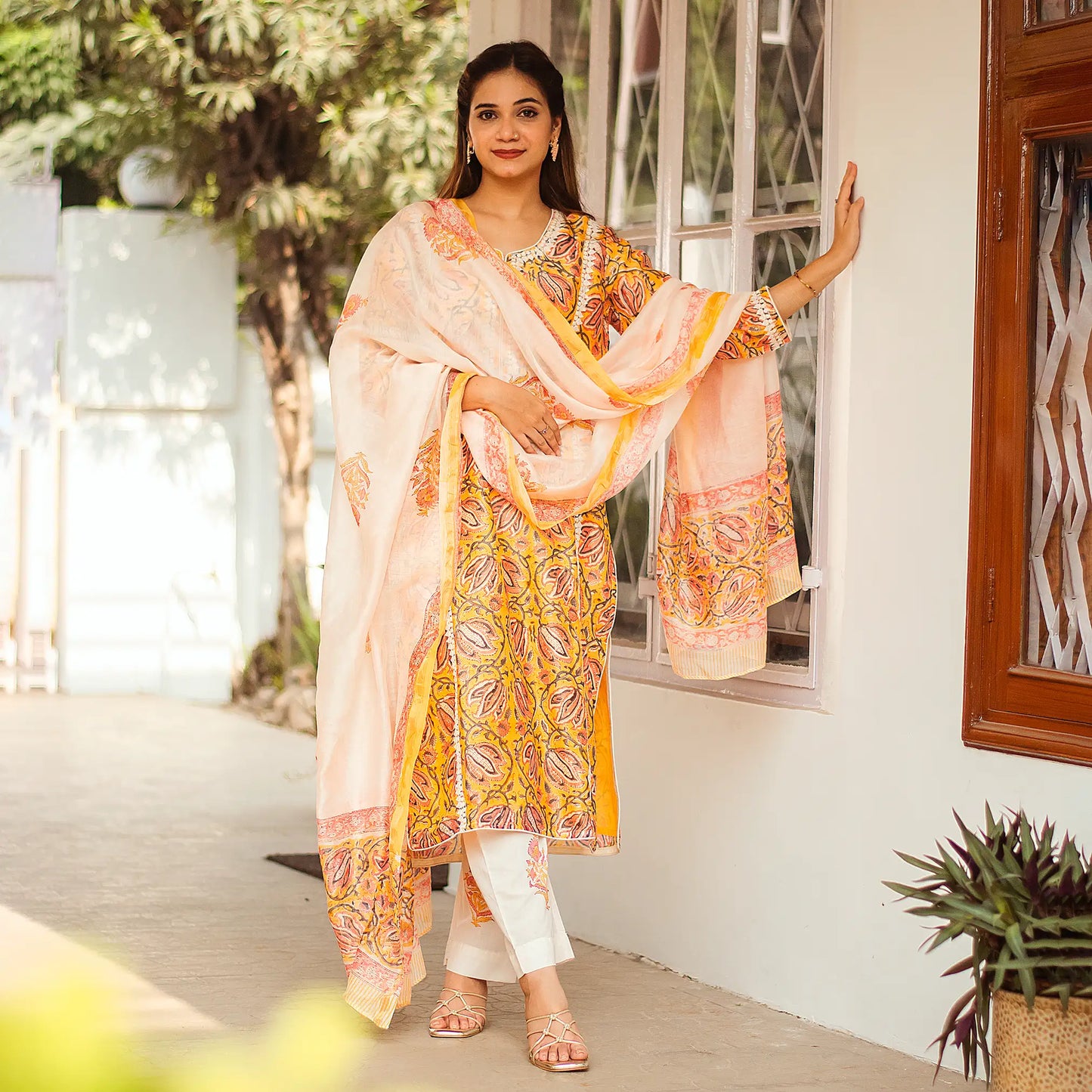 Yellow kalamkari print maheshwari applique work kalidar kurta with off white maheshwari dupatta and trousers