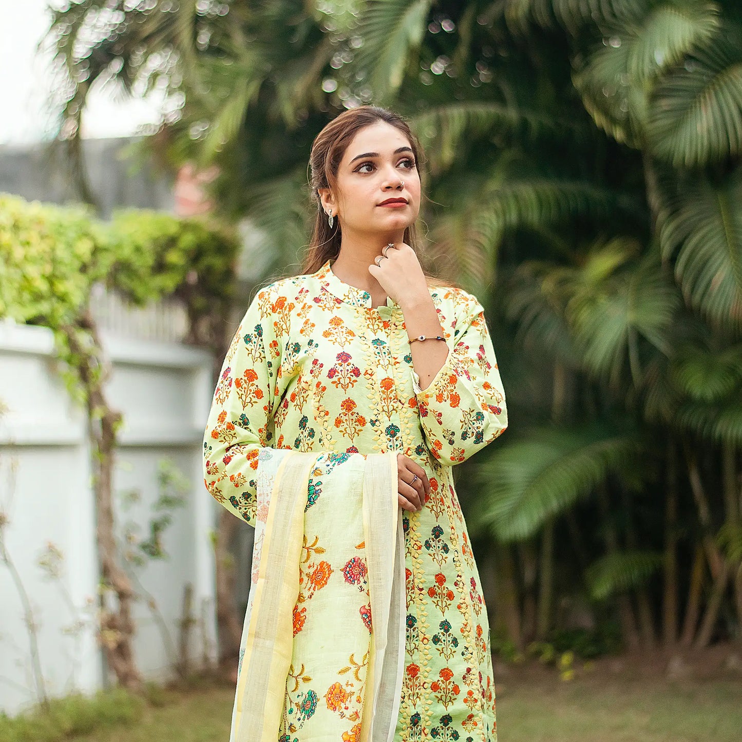 Tea green printed linen kalidar kurta with applique work, green linen dupatta and green palazzo