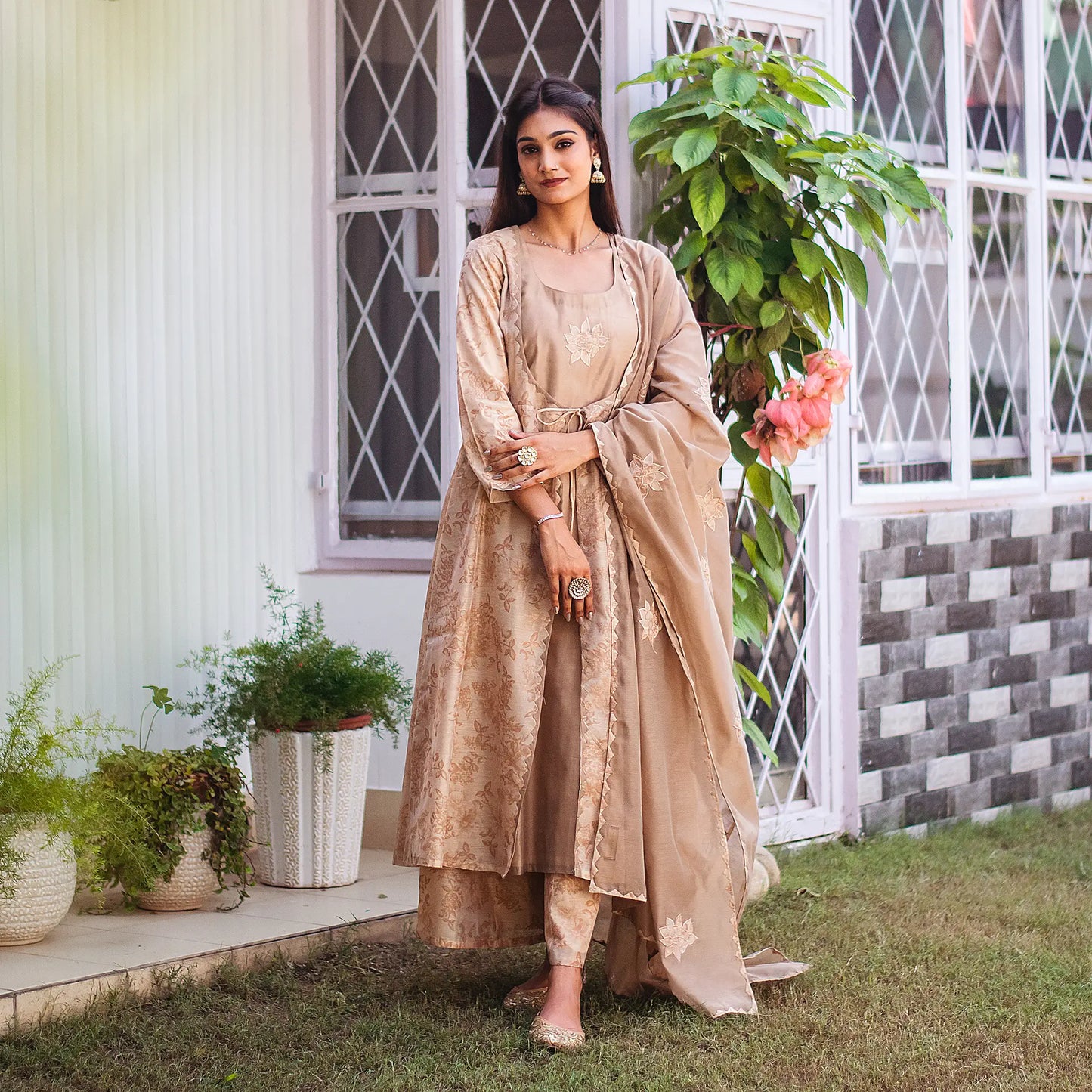 Complete ensemble of the beige floral print kurta set, including the angrakha kurta, palazzo trousers, and chanderi dupatta, as worn by the model