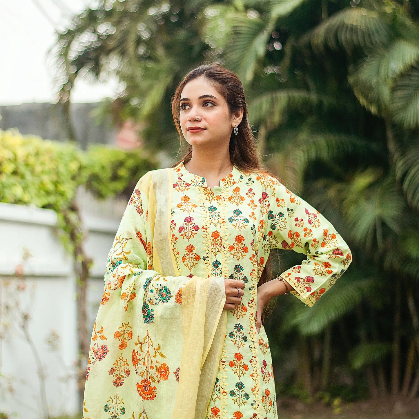 Tea green printed linen kalidar kurta with applique work, green linen dupatta and green palazzo