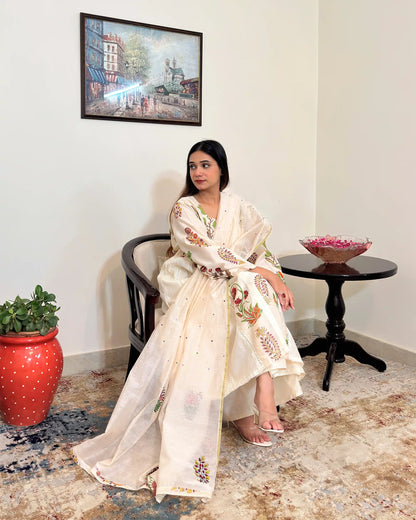 Off-white chanderi A-line kurta and dupatta with multicolour floral hand embroidery and off-white palazzo