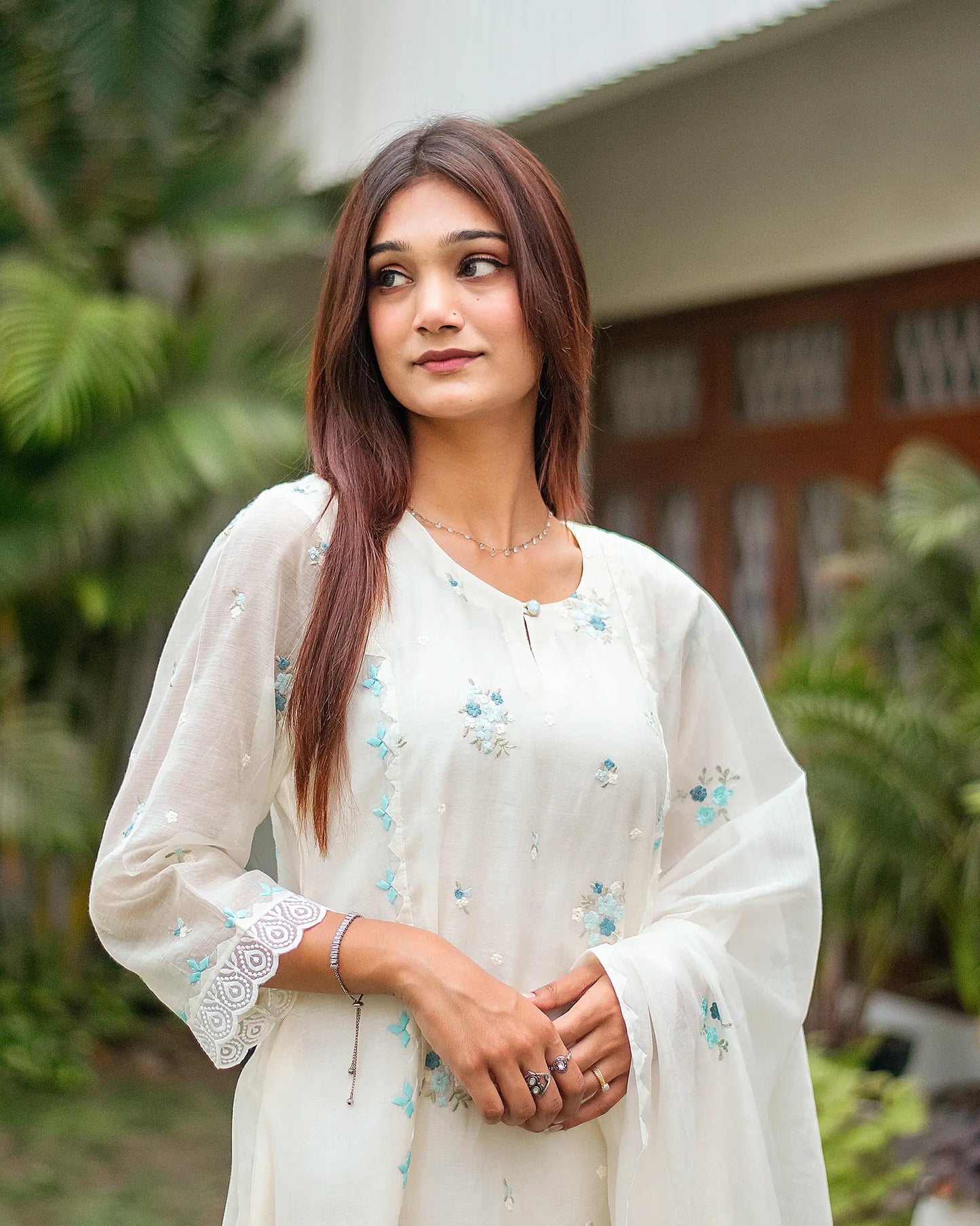 Off-white chanderi kurti, dupatta and trousers with blue embroidery & applique work