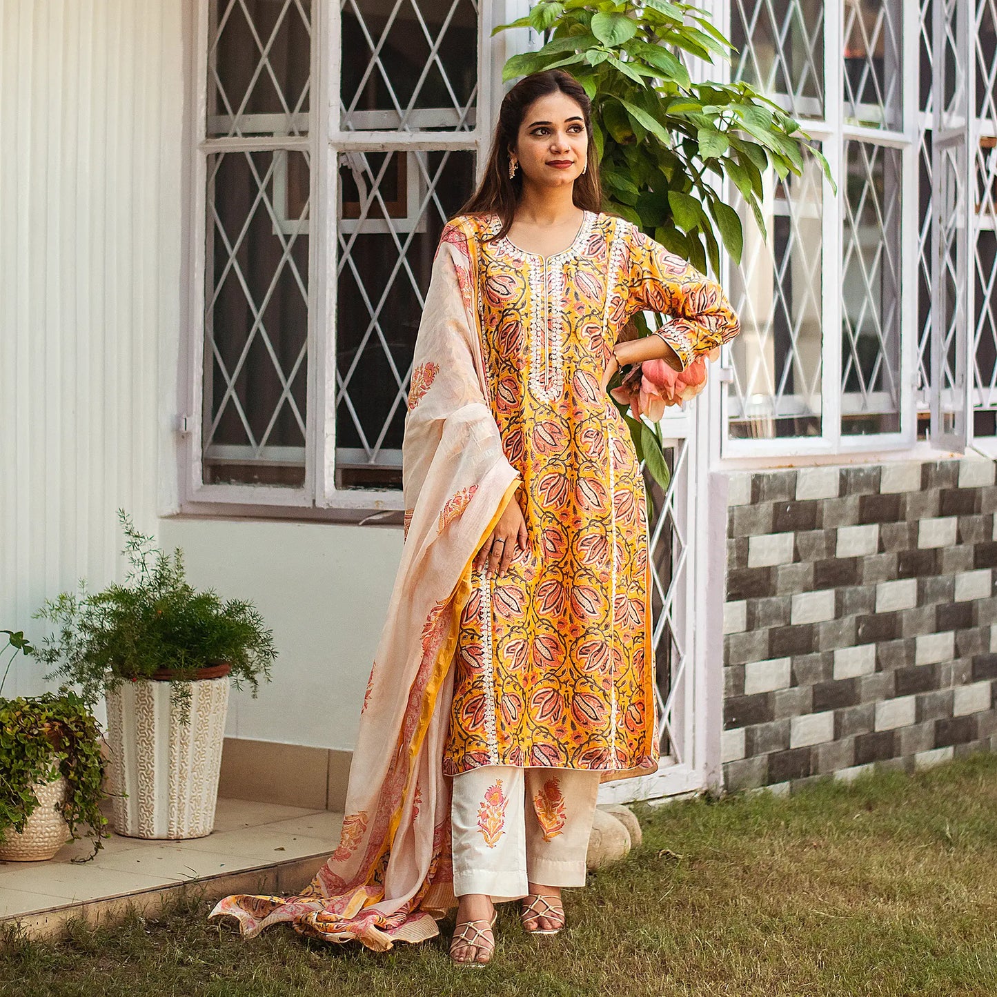 Yellow kalamkari print maheshwari applique work kalidar kurta with off white maheshwari dupatta and trousers