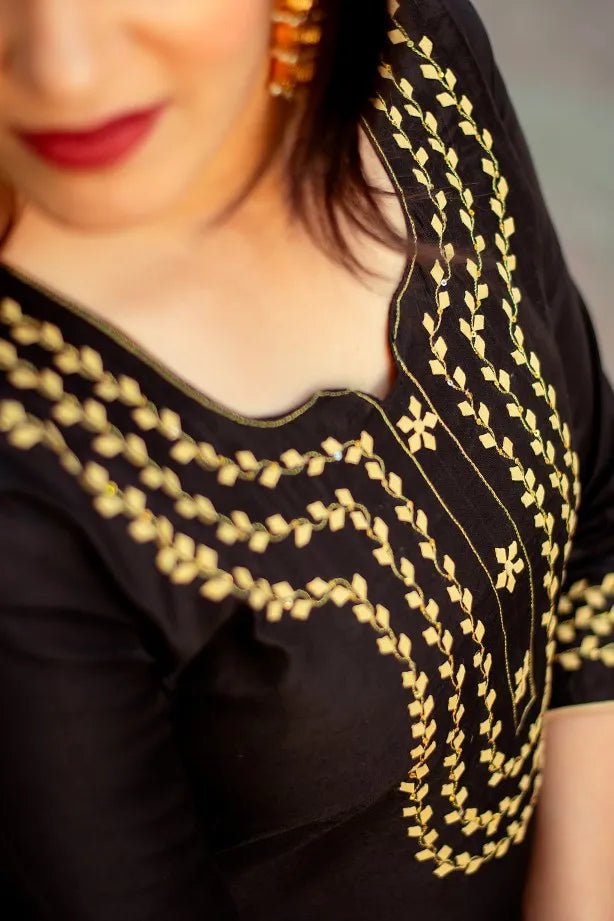 Black chanderi Kurti with applique work black chanderi dupatta and golden trousers