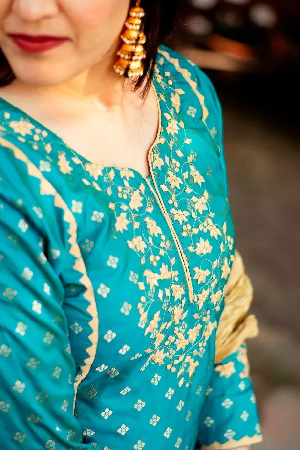 Blue Banarasi Silk Kurta with applique, blue silk palazzo and golden tissue dupatta