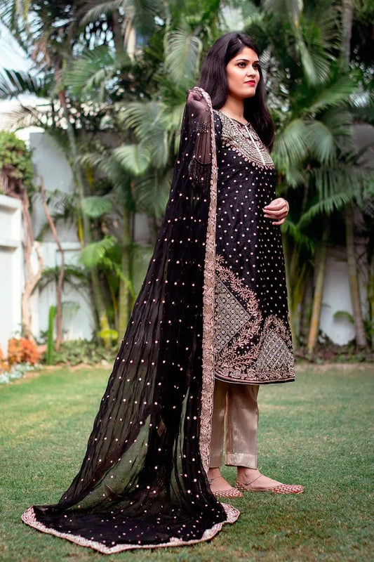 Black silk kurta with zardozi, black chiffon dupatta and golden trouser