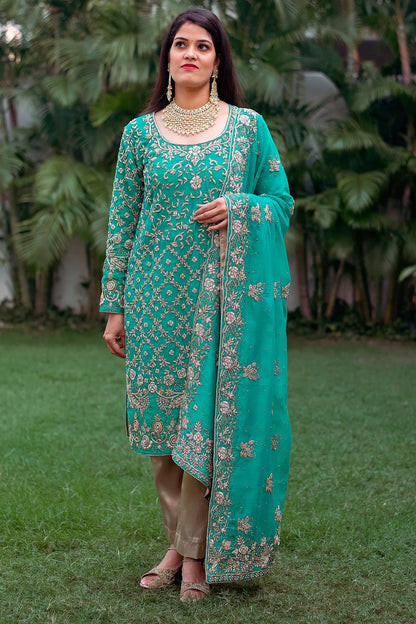 Sea-green chanderi zardozi work kurta and dupatta with golden trousers