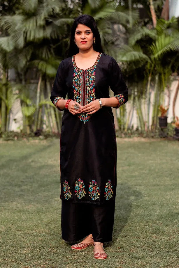 Stylish woman in Black Resham Embroidered Chanderi Kurta paired with Black Palazzo & Jamawar Silk Dupatta