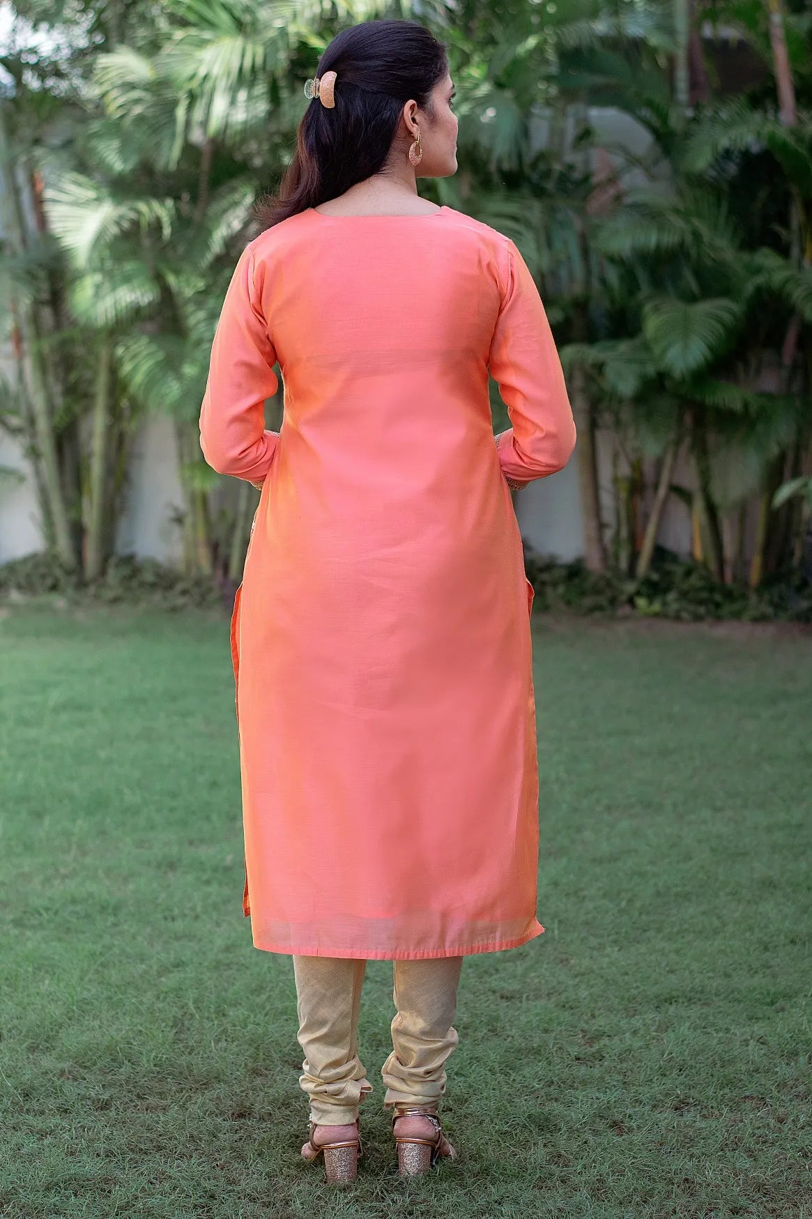 Ethnic wear: Peach Chanderi Kurta and Dupatta with Gota Work, complemented by a Golden Churidar.