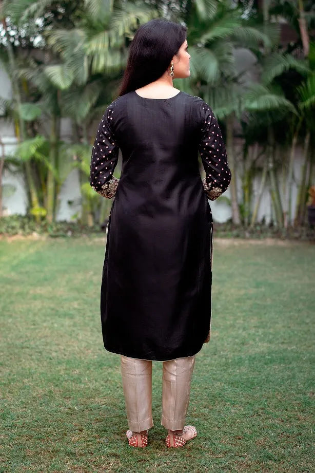 Black silk kurta with zardozi, black chiffon dupatta and golden trouser