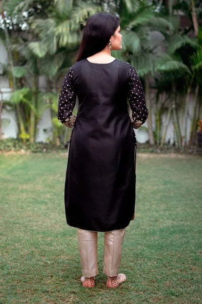 Black silk kurta with zardozi, black chiffon dupatta and golden trouser