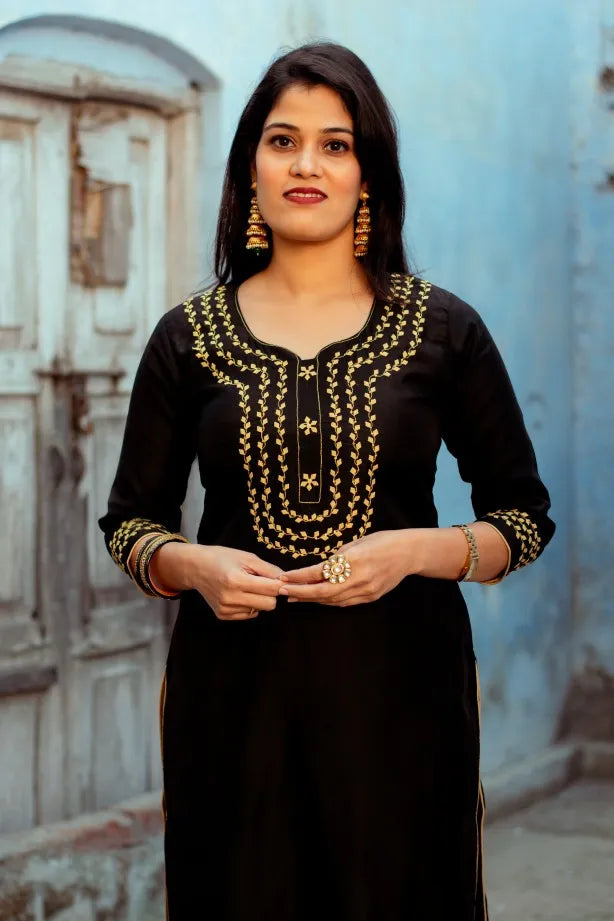 Black chanderi Kurti with applique work black chanderi dupatta and golden trousers