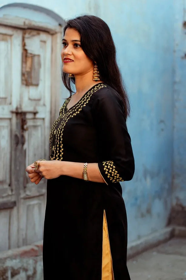 Black chanderi Kurti with applique work black chanderi dupatta and golden trousers