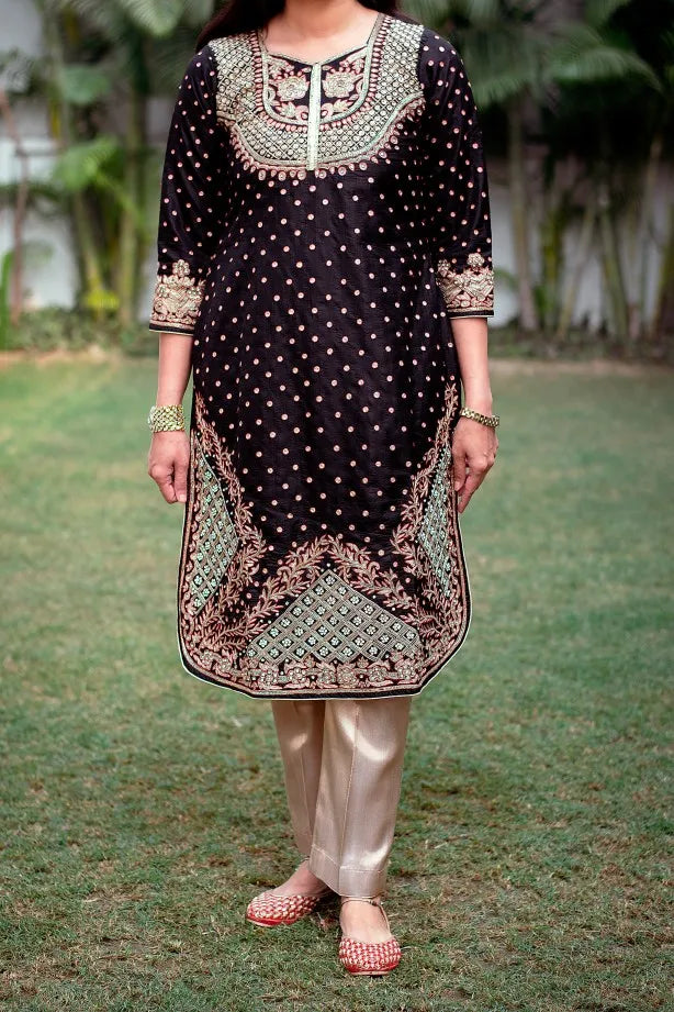 Black silk kurta with zardozi, black chiffon dupatta and golden trouser