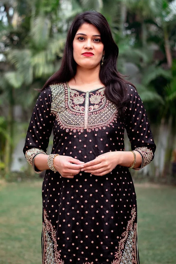 Black silk kurta with zardozi, black chiffon dupatta and golden trouser