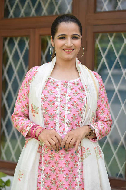 Indian women wearing applique work kurta set