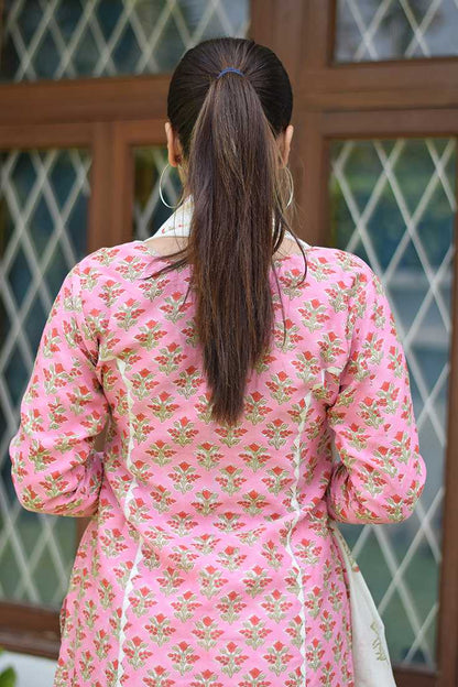 Indian women wearing pink applique work kurtis