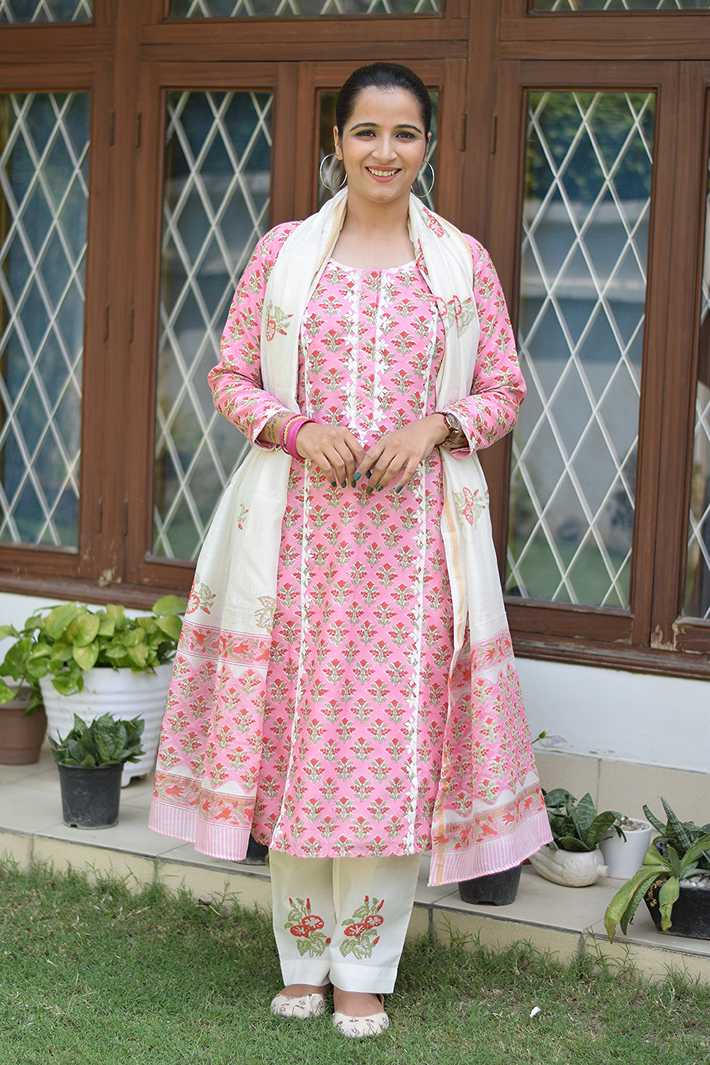Indian women wearing pink applique work suit