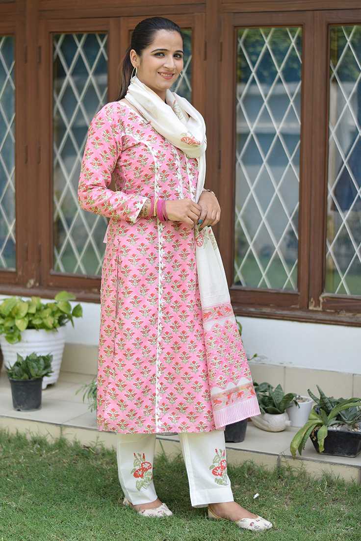 Indian women showing applique work designs