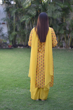 Indian women wearing  short yellow kurti
