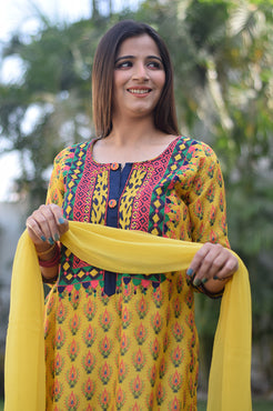 Indian women wearing yellow party wear kurta