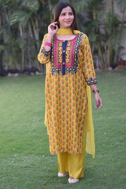 Indian women wearing  long kurti yellow colour
