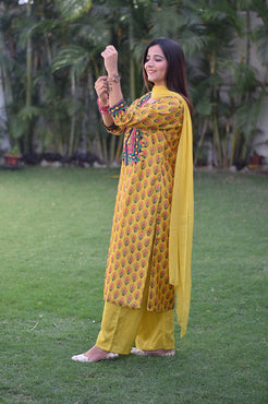 Indian women wearing  yellow kurta design for girl