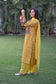 Indian women wearing  yellow kurta design for girl