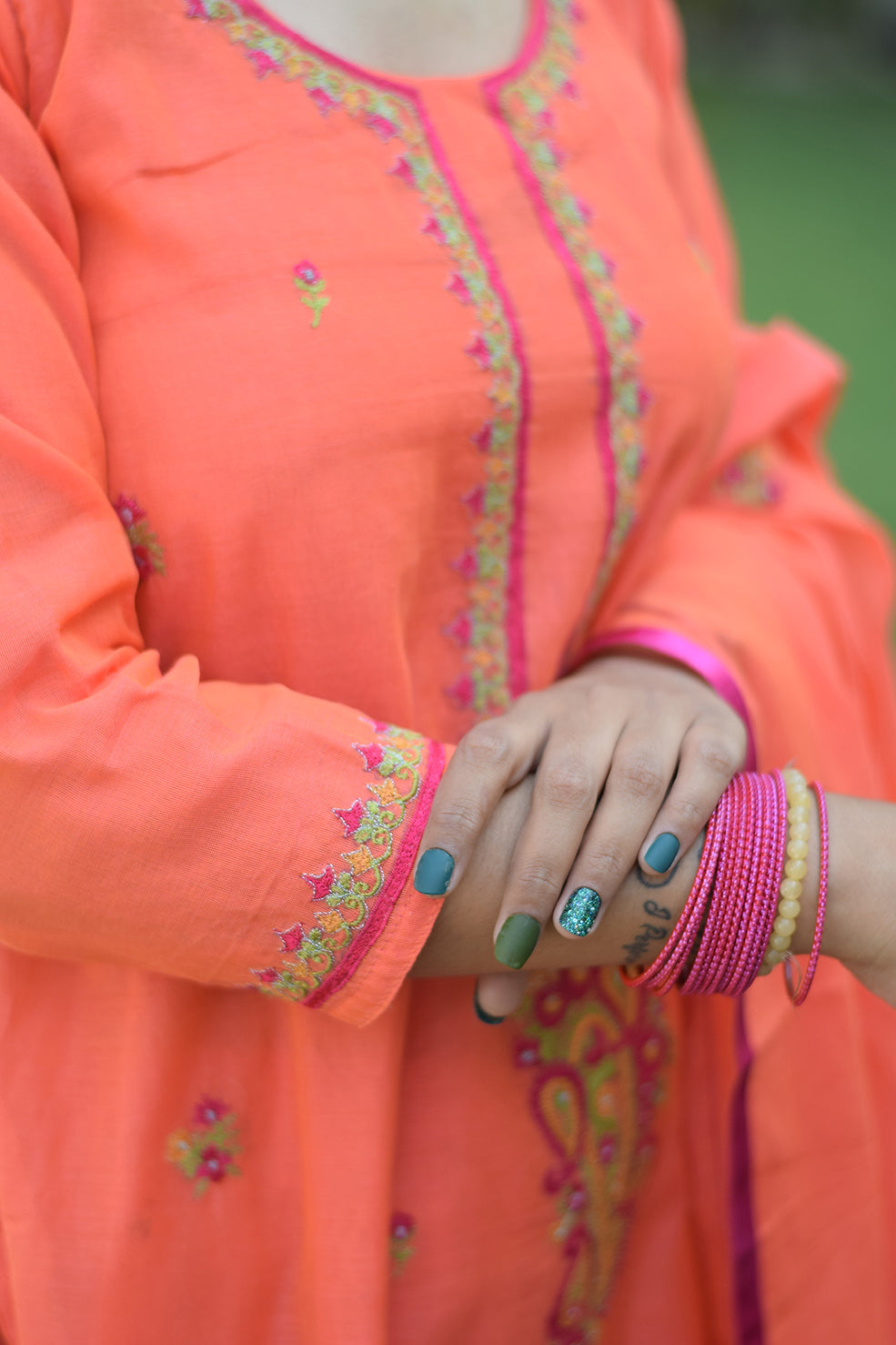 Indian women wearing straight embroidered kurta