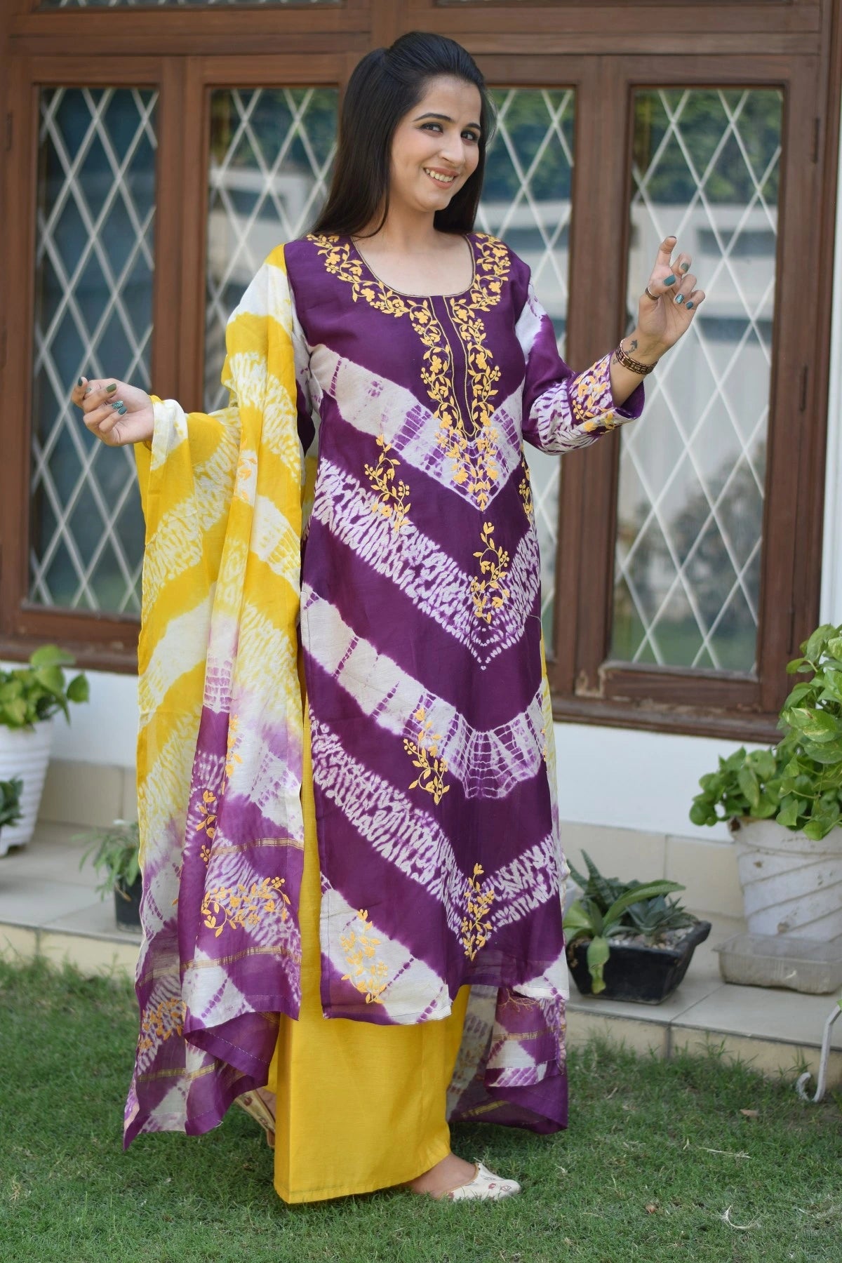 Indian women wearing applique work suits