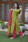A radiant lady in a zari hand work suit that illuminates her charm and grace.