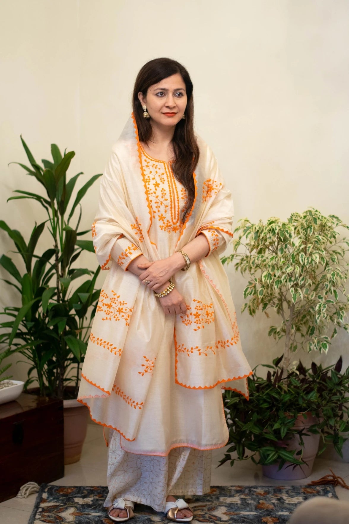 Indian women wearing cream white chanderi kurta