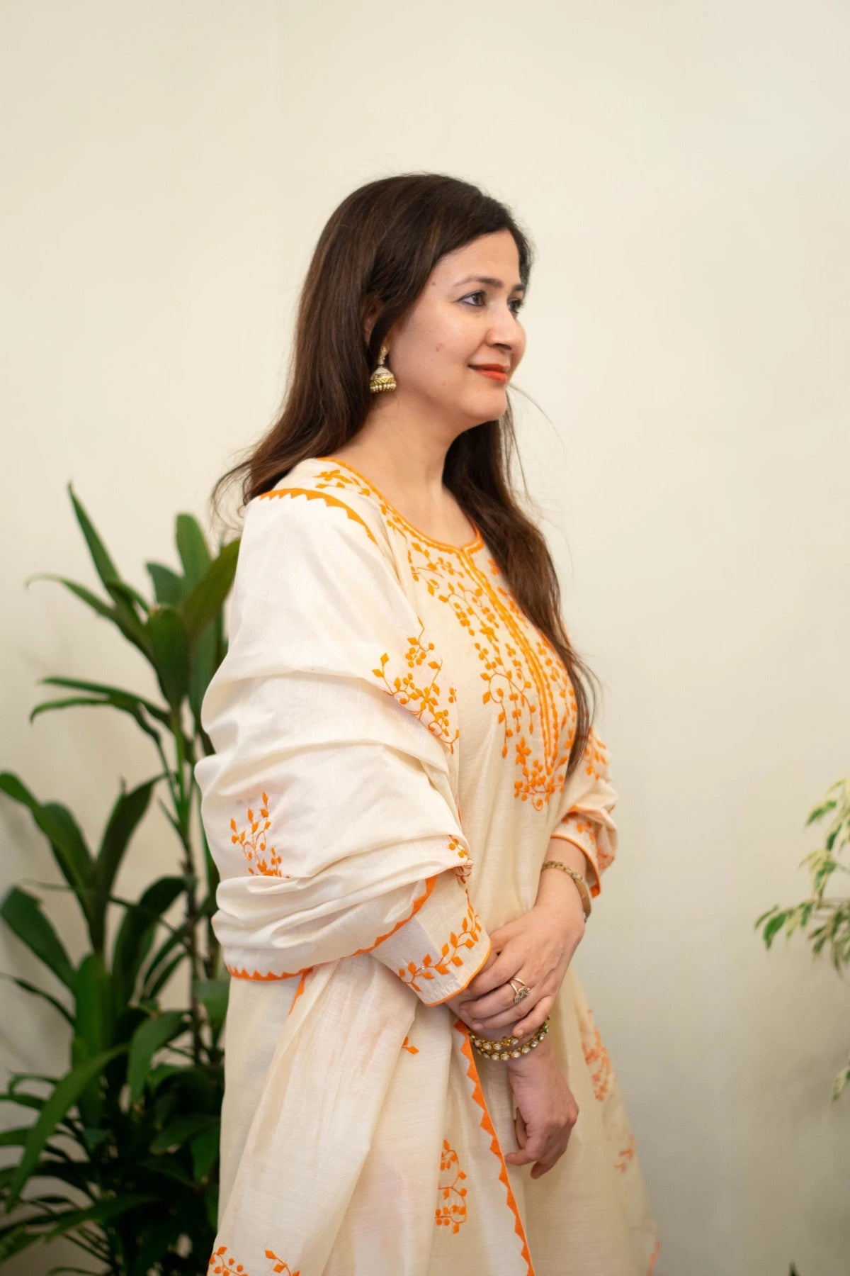 Indian women wearing off white chanderi kurta