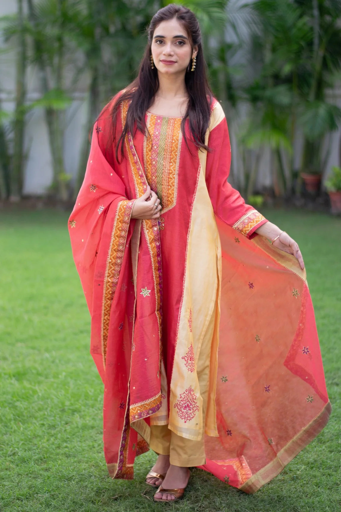 Indian women wearing zardozi suit
