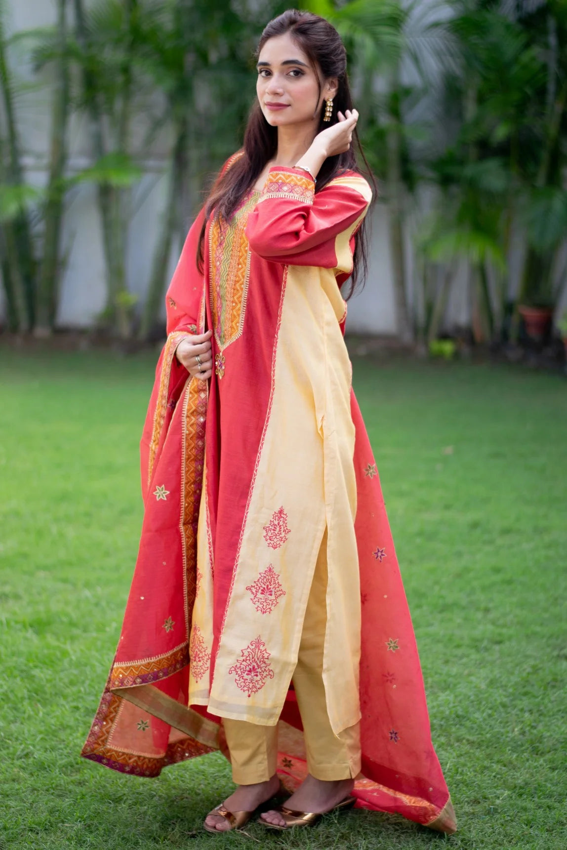 Premium Photo | Attractive young girl wearing yellow embroidery shalwar  kameez standing in garden