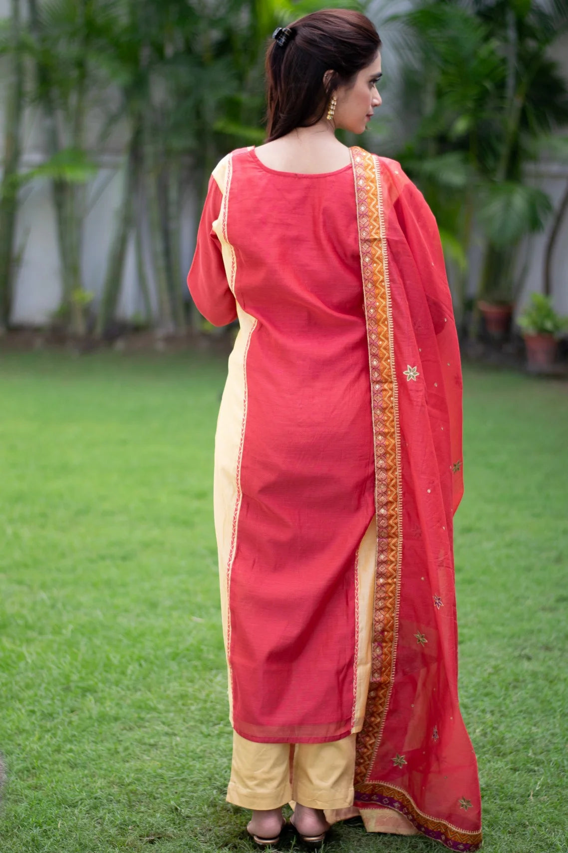 Indian women wearing zardosi work dress