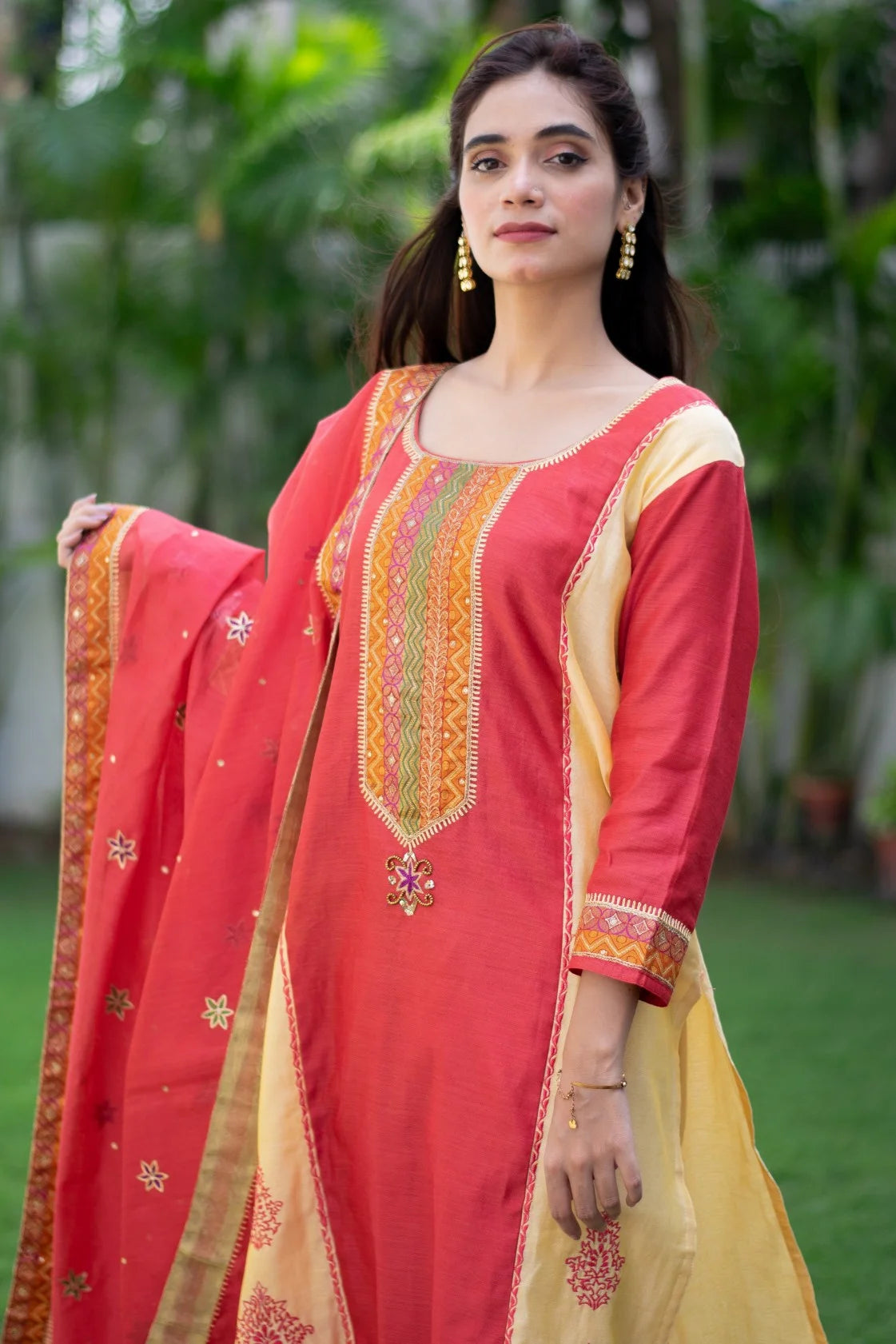 Indian women wearing embroidered zardosi kurta