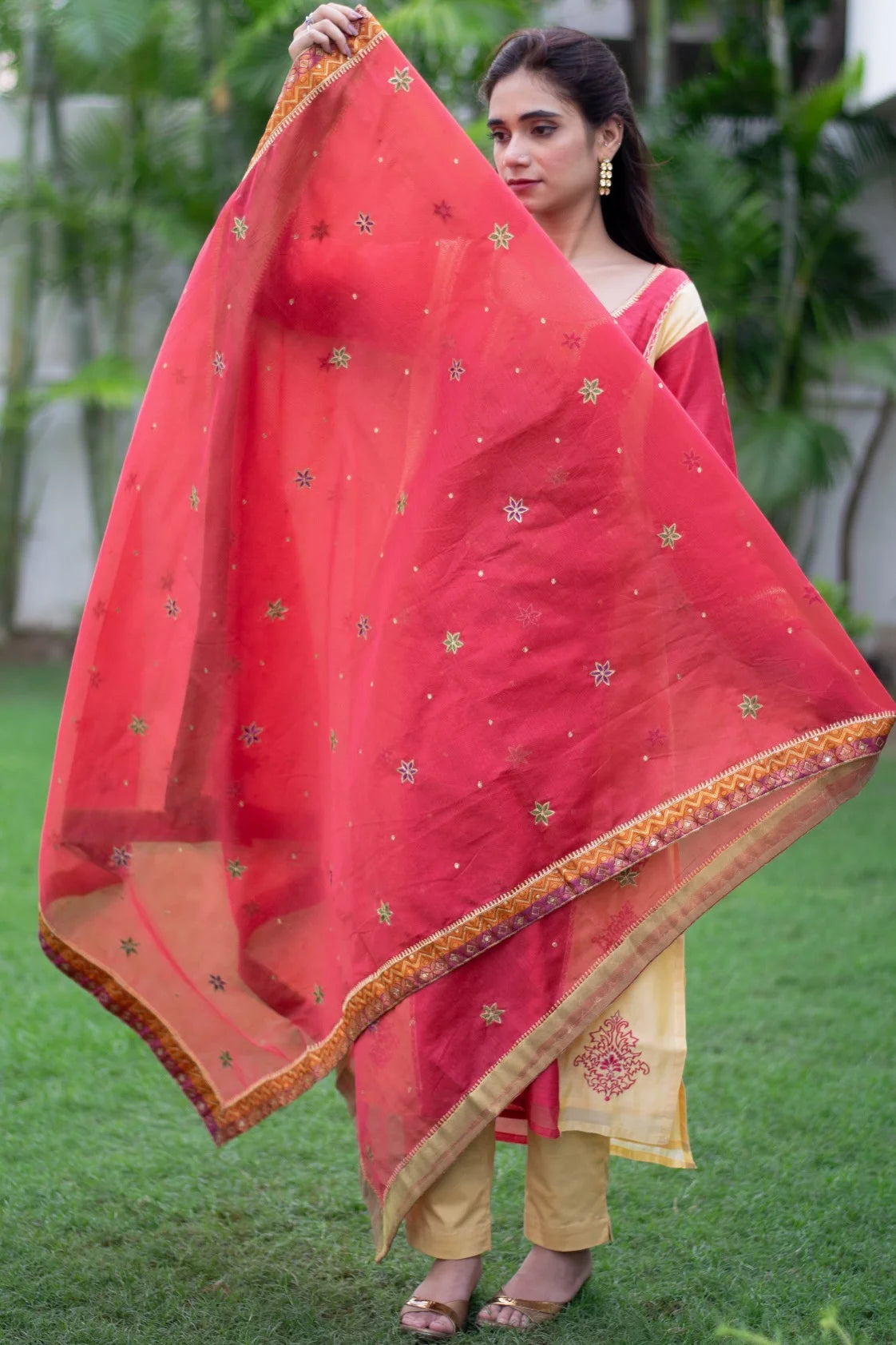 Indian women wearing zardosi work kurti