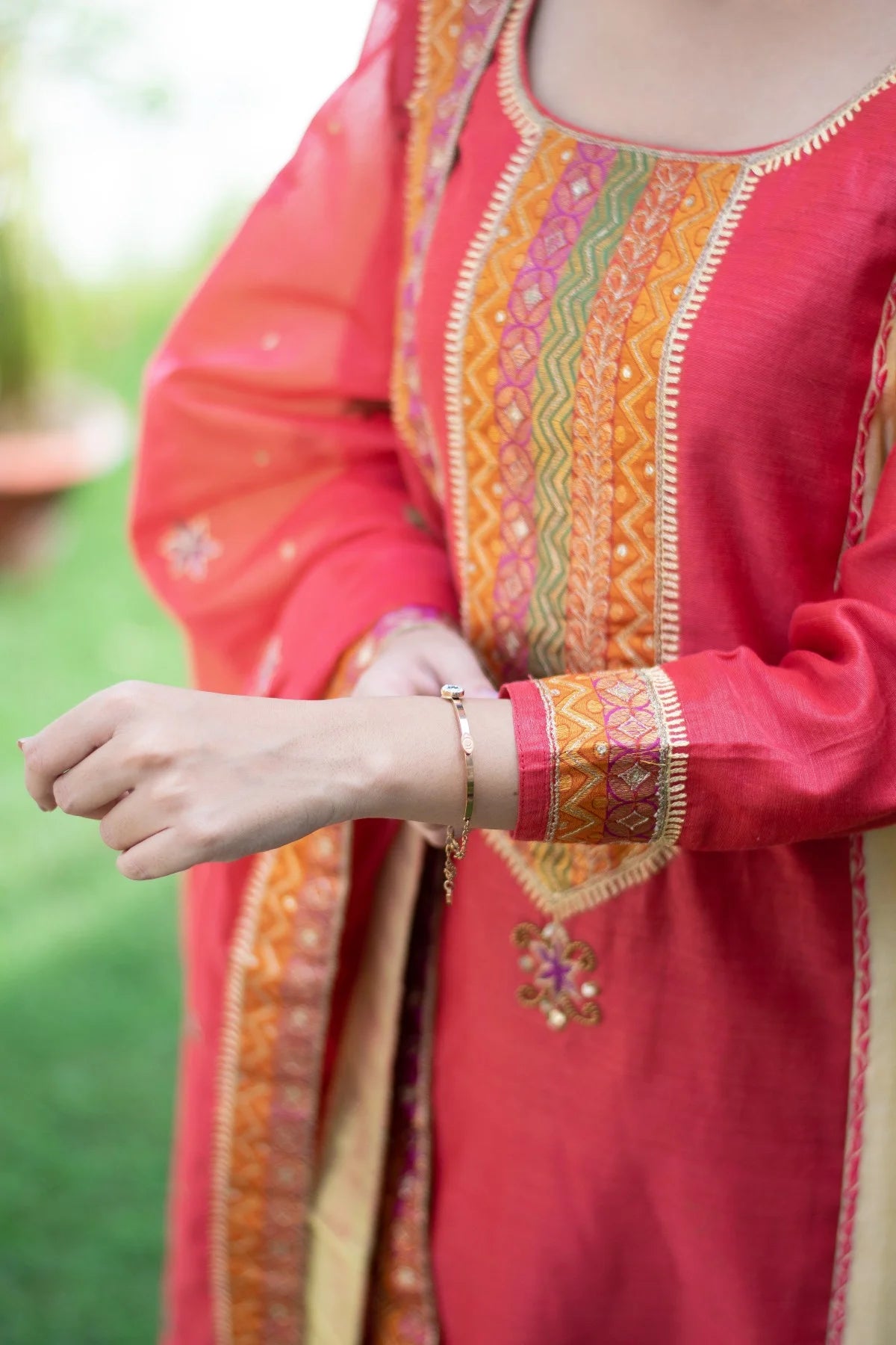 Indian women wearing  zardosi work kurta set