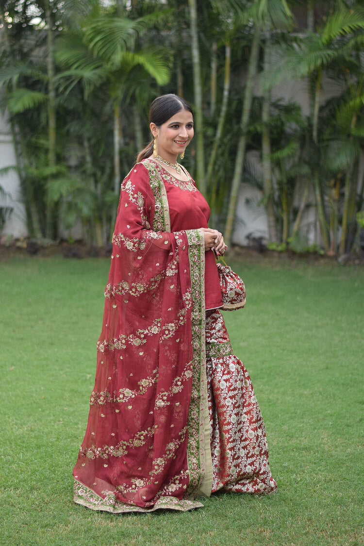 Stunning Maroon Silk & Kamkhab Tilla Embroidered Gharara set on a beautiful woman