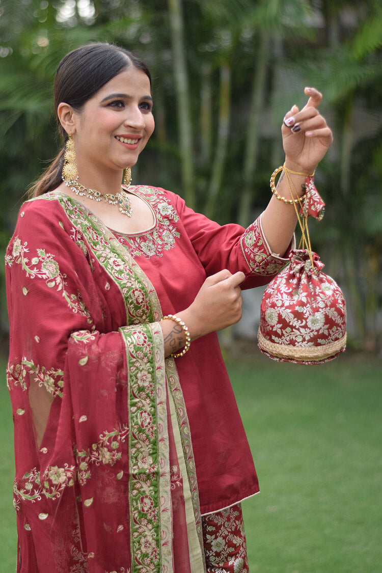 Traditional Maroon Silk & Kamkhab Tilla Embroidered Gharara set on a beautiful lady