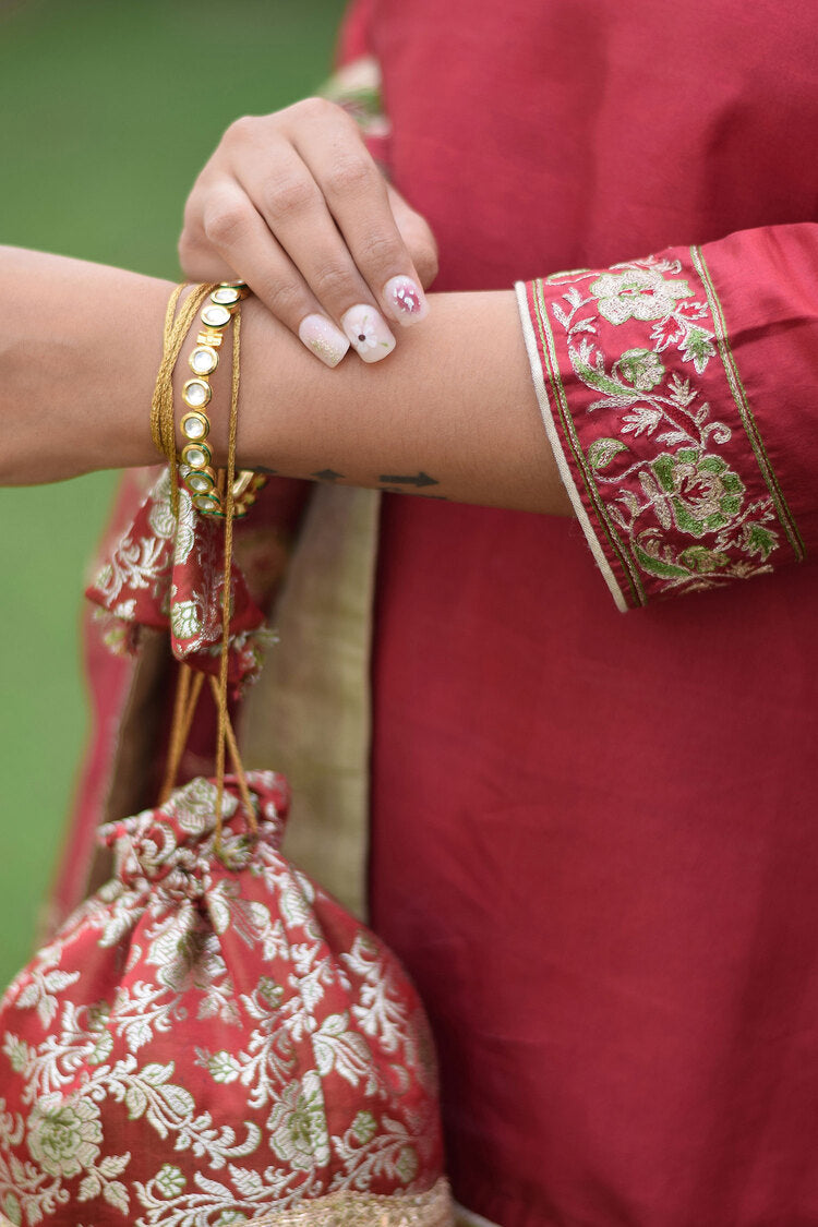 Gorgeous Maroon Silk & Kamkhab Tilla Embroidered Gharara set on a woman