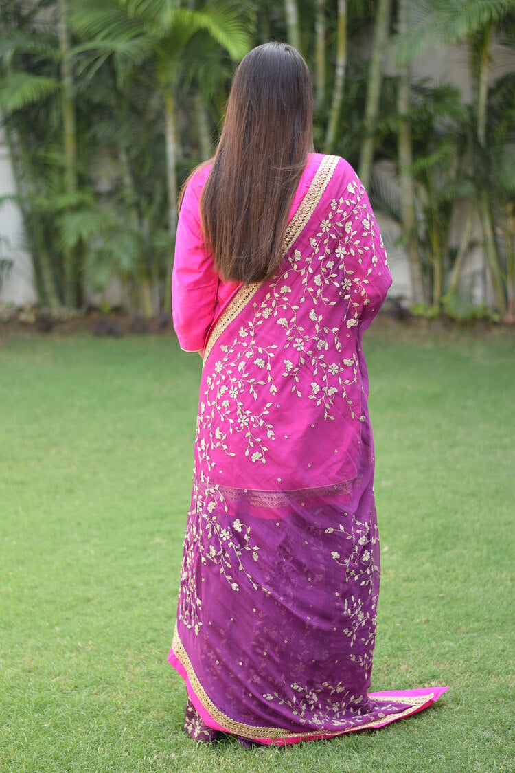 A fashion-forward woman in a chic Purple and Magenta Silk Applique Gharara set.