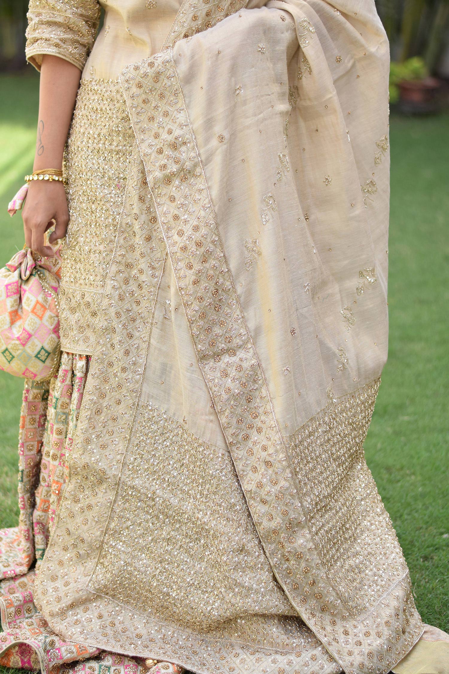 Indian women wearing Brocade Gharara with dupatta