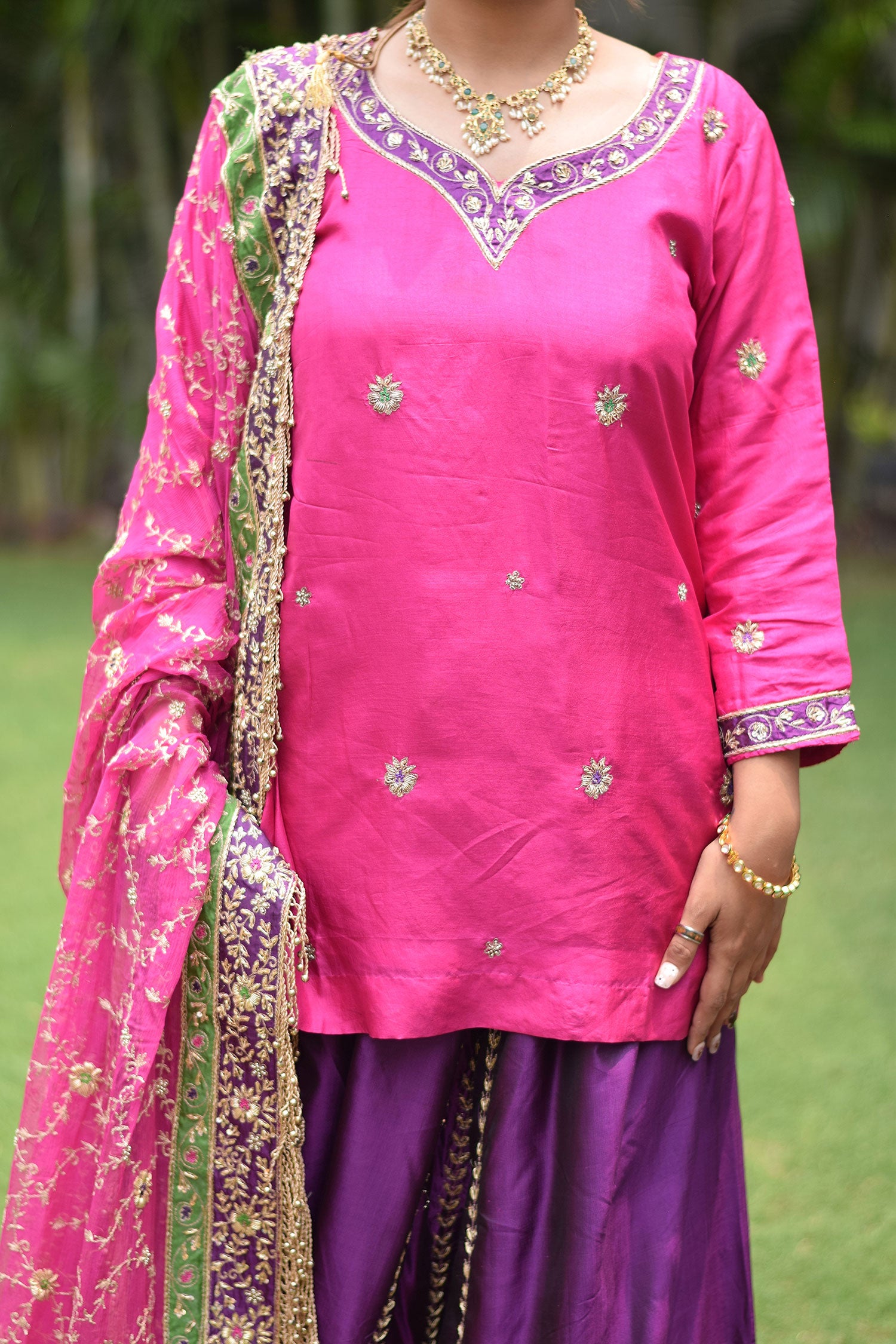Stunning bridal attire of Bride wearing Magenta & Purple Bridal Kamkhab Farshi Gharara Set With Zardozi Work