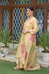 A graceful outfit featuring a pink and green patchwork Chanderi dupatta paired with a golden kurta and palazzo pants.
