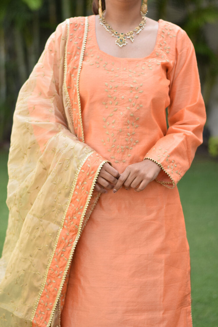 A Peach Kamkhab Farshi Gharara, Peach Chanderi Kurta & Golden Dupatta with Tissue Applique Work outfit that exudes grace and sophistication