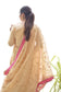 A woman exuding grace and elegance in a Magenta Kamkhab Farshi Gharara, Golden Chanderi Kurta & Dupatta with Tissue Applique Work.
